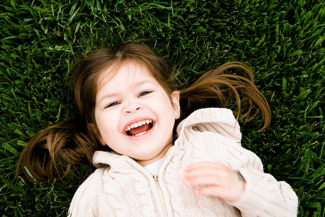A child laughing; Things That Will Improve Your Baby's Development